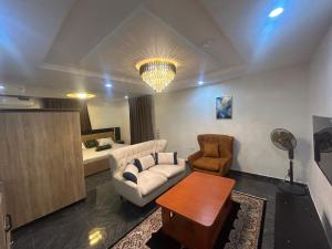 Posezení v ubytování The Luxe Apartment