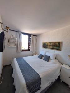 Ένα ή περισσότερα κρεβάτια σε δωμάτιο στο Casa del bosque