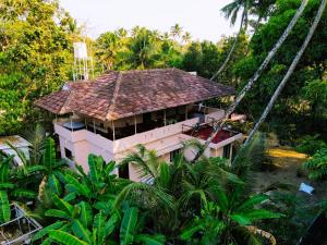 Taman di luar Bella Beach Villa