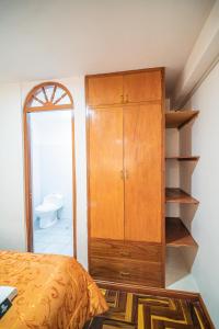 Postel nebo postele na pokoji v ubytování Inkas Peru Hostal