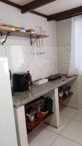 Kuchyň nebo kuchyňský kout v ubytování Kitnet MiniHouse do Alto