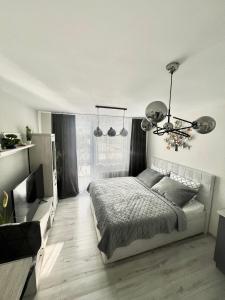 Postel nebo postele na pokoji v ubytování Luxusný Apartmán Váh