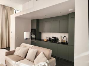 Η κουζίνα ή μικρή κουζίνα στο Loft Moderne et Lumineux
