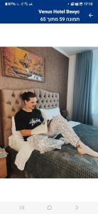 Venus hotel客房内的一张或多张床位
