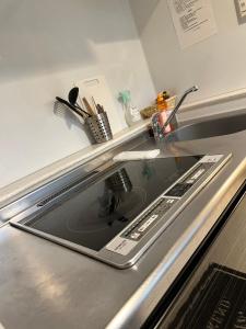 Köök või kööginurk majutusasutuses Residence天王寺東