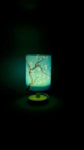 a lamp with a tree on top of it at Maison d'Artiste Siracusa Belvedere in Belvedere