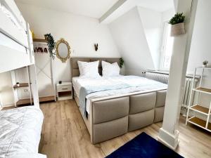Katil atau katil-katil dalam bilik di Sunny Stay Apartments Coburg zentral mit Parkplatz
