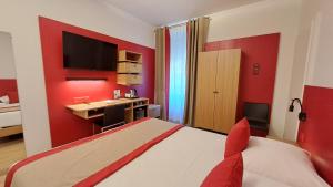 Cama ou camas em um quarto em Hotel International & Terminus