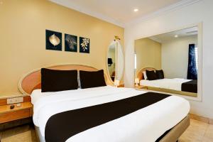 Postel nebo postele na pokoji v ubytování De Classico Hotel