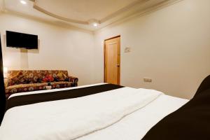 Postel nebo postele na pokoji v ubytování De Classico Hotel