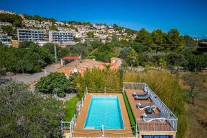 The swimming pool at or close to Ideal Property Mallorca - Can Caragol Font de Sa Cala