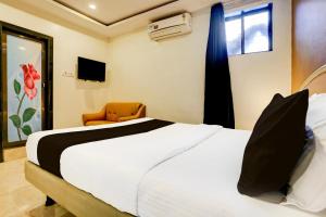 Postel nebo postele na pokoji v ubytování De Classico Hotel
