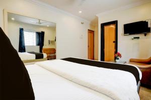 TV a/nebo společenská místnost v ubytování De Classico Hotel