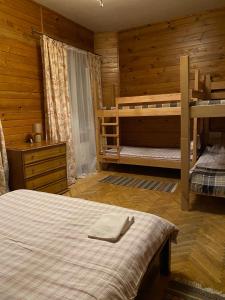 Postel nebo postele na pokoji v ubytování Візерунок