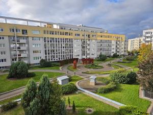 En have udenfor Apartament Malta & basen ,kort tenisowy w cenie