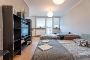 Łóżko lub łóżka w pokoju w obiekcie Apartament Centrum 32m2 Kłodzko - Przyjaciół Ziemi Kłodzkiej - Spokój, Cisza, Bliskość Atrakcji