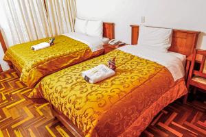 Postel nebo postele na pokoji v ubytování Inkas Peru Hostal + 32 fotografií