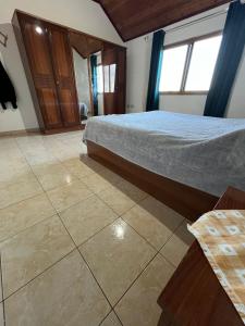 Postel nebo postele na pokoji v ubytování Karaj Apartments