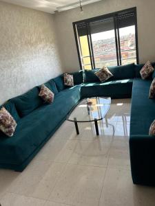 Posezení v ubytování Appartement à Sidi Rahal - 5 min de la plage