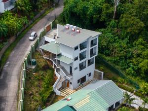 an overhead view of a white building with a roof at Sorento Holiday Apartments in Glacis