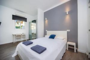 Mallorca Rooms Can Pastilla客房内的一张或多张床位
