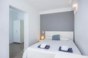 Mallorca Rooms Can Pastilla客房内的一张或多张床位
