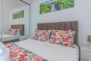 Ένα ή περισσότερα κρεβάτια σε δωμάτιο στο Flowers island house 5