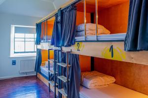 Katil atau katil-katil dalam bilik di Leevin Hostel George
