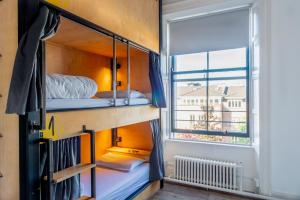 Katil atau katil-katil dalam bilik di Leevin Hostel George