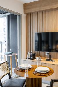 TV a/nebo společenská místnost v ubytování ARVO Luxury Studio Rebouca Apartment