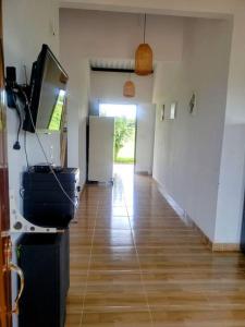 TV a/nebo společenská místnost v ubytování Hermosa casa campestre en Villanueva