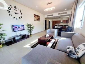 Un lugar para sentarse en Aspire Tower # Two Bedroom Luxury Suite Juffair