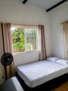 Postel nebo postele na pokoji v ubytování Hermosa casa campestre en Villanueva