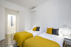 Ένα ή περισσότερα κρεβάτια σε δωμάτιο στο Cycle haven apt in Girona center