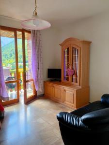 Μια τηλεόραση ή/και κέντρο ψυχαγωγίας στο Villa Aprica Appartamenti