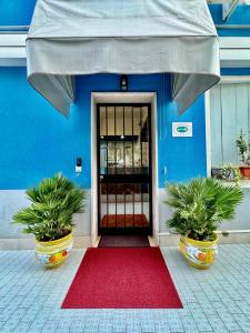 A fachada ou entrada de Hotel Guidi