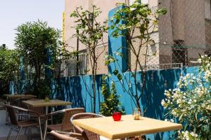 Um jardim no exterior de Hotel Guidi