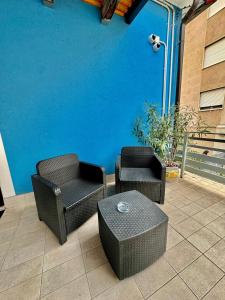 Uma área de estar em Hotel Guidi