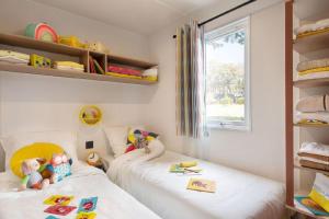 Posteľ alebo postele v izbe v ubytovaní Camping Sènia Caballo de Mar