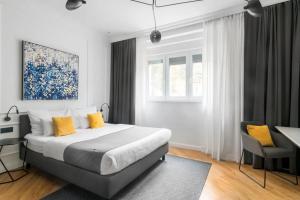 Posteľ alebo postele v izbe v ubytovaní Fingerprint Tree Apartments