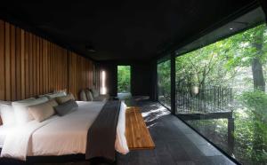 Voodi või voodid majutusasutuse Rio Perdido Hotel & Thermal River toas