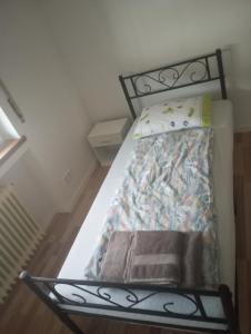 Ένα ή περισσότερα κρεβάτια σε δωμάτιο στο Cozy Home