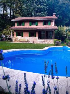 The swimming pool at or close to Casa Rural El Edén del Ungría