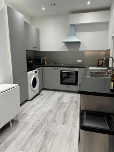 Η κουζίνα ή μικρή κουζίνα στο charmante chambre