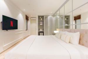 Voodi või voodid majutusasutuse Keypad Hotel - Nhân Hòa toas