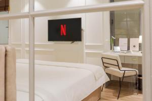 Voodi või voodid majutusasutuse Keypad Hotel - Nhân Hòa toas