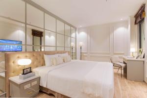 Voodi või voodid majutusasutuse Keypad Hotel - Nhân Hòa toas
