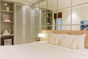 Voodi või voodid majutusasutuse Keypad Hotel - Nhân Hòa toas