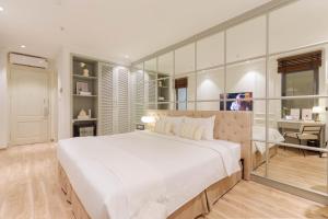 Voodi või voodid majutusasutuse Keypad Hotel - Nhân Hòa toas