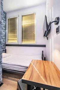 Postel nebo postele na pokoji v ubytování Vola Hostel